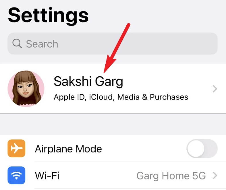 Go to your iPhone settings and tap your ‘Name card’ at the top.
